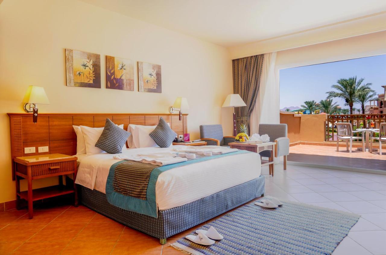 Charmillion Club Aquapark Hotel Sharm El Sheikk Exterior foto A room at the Hilton Sharm El Sheikh
