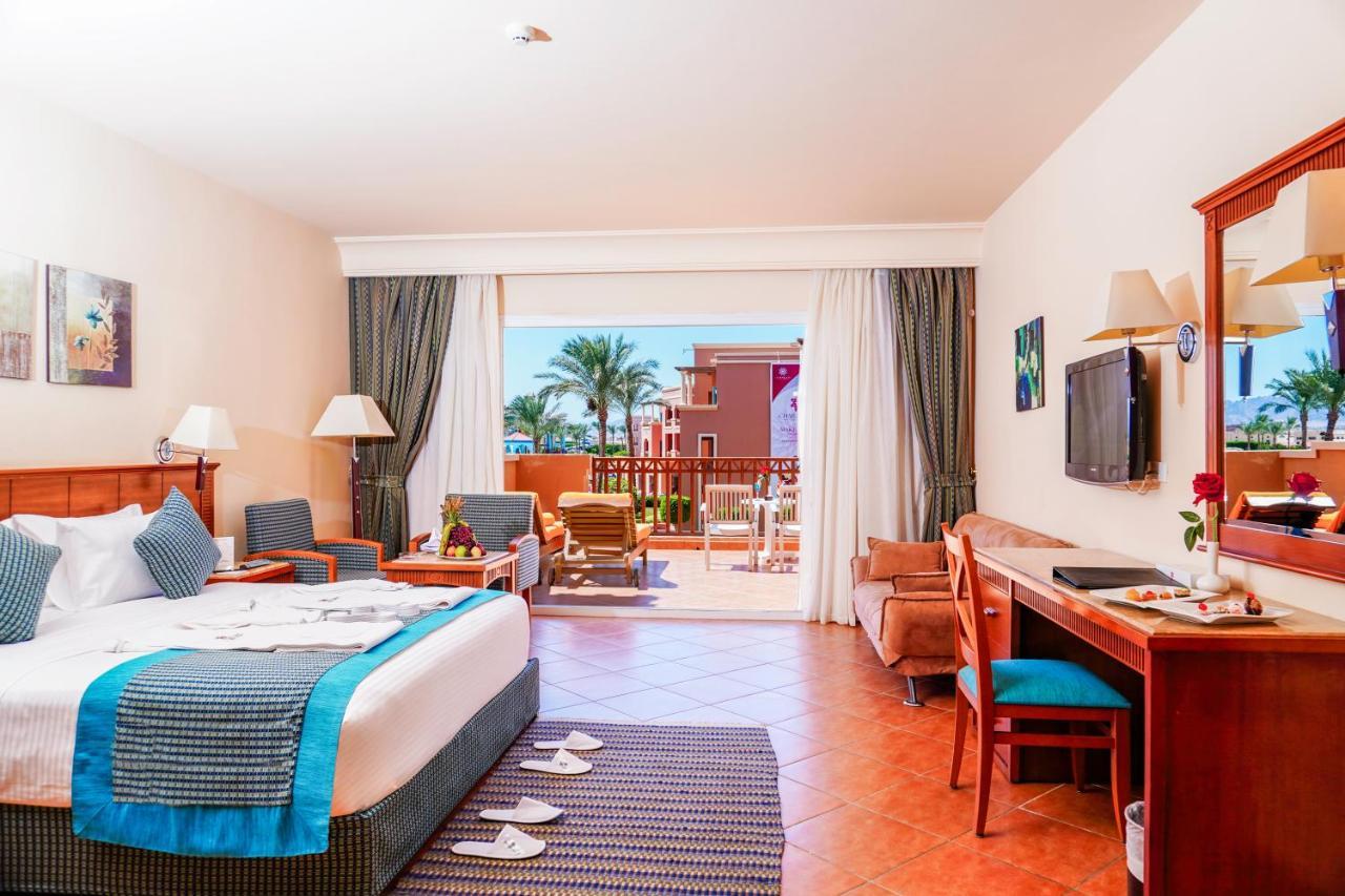 Charmillion Club Aquapark Hotel Sharm El Sheikk Quarto foto A room at the Hilton Sharm El Sheikh