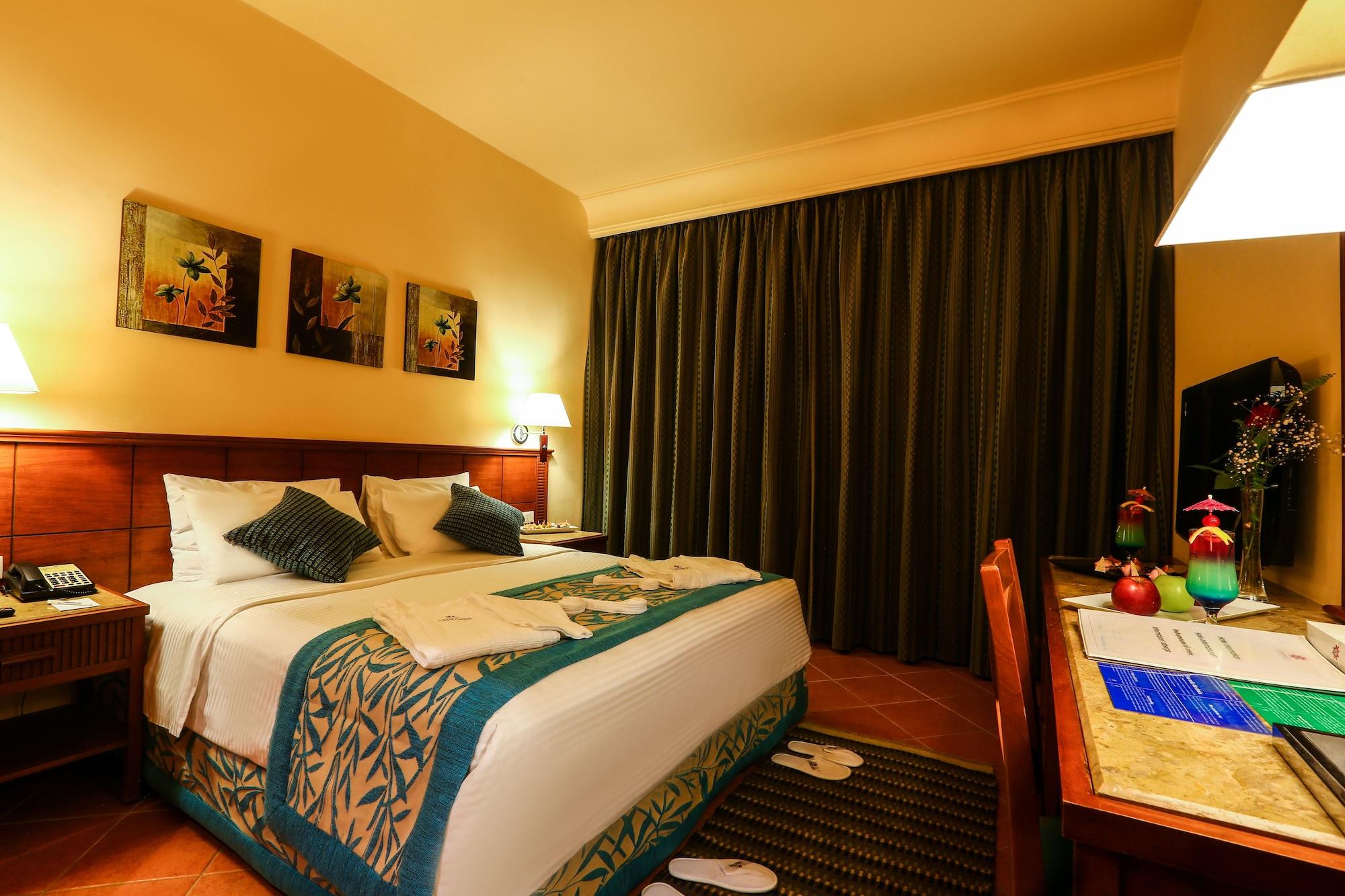 Charmillion Club Aquapark Hotel Sharm El Sheikk Exterior foto A bedroom at the hotel