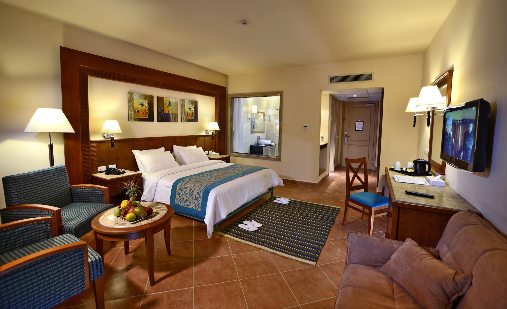 Charmillion Club Aquapark Hotel Sharm El Sheikk Exterior foto A room at the Hilton Sharm El Sheikh